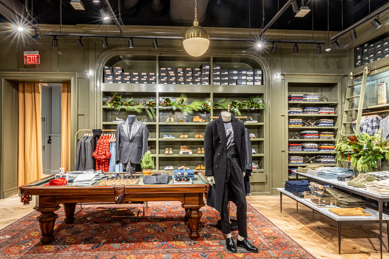 Boston - Store Display - Styled table with accessories, Suits, Shoe Wall
