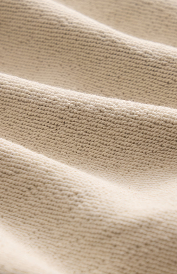 5 different patterns of tweed are shown on jacket collars.