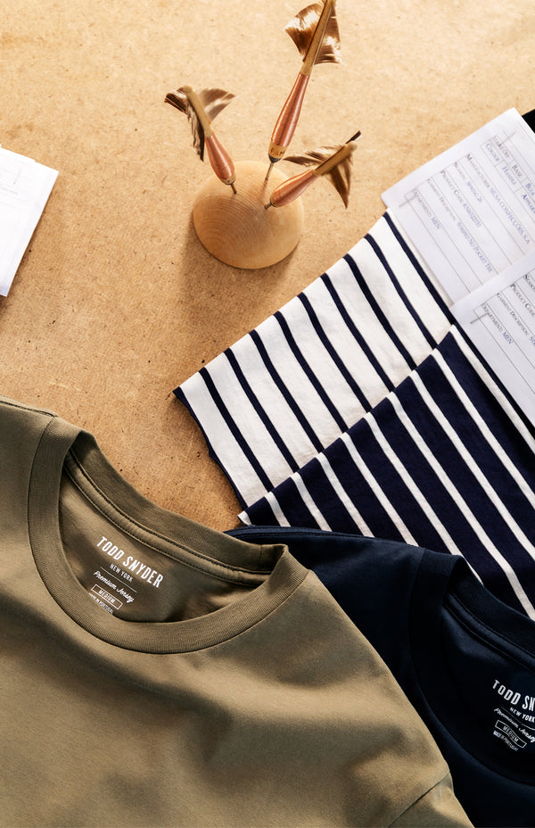 5 different patterns of tweed are shown on jacket collars.