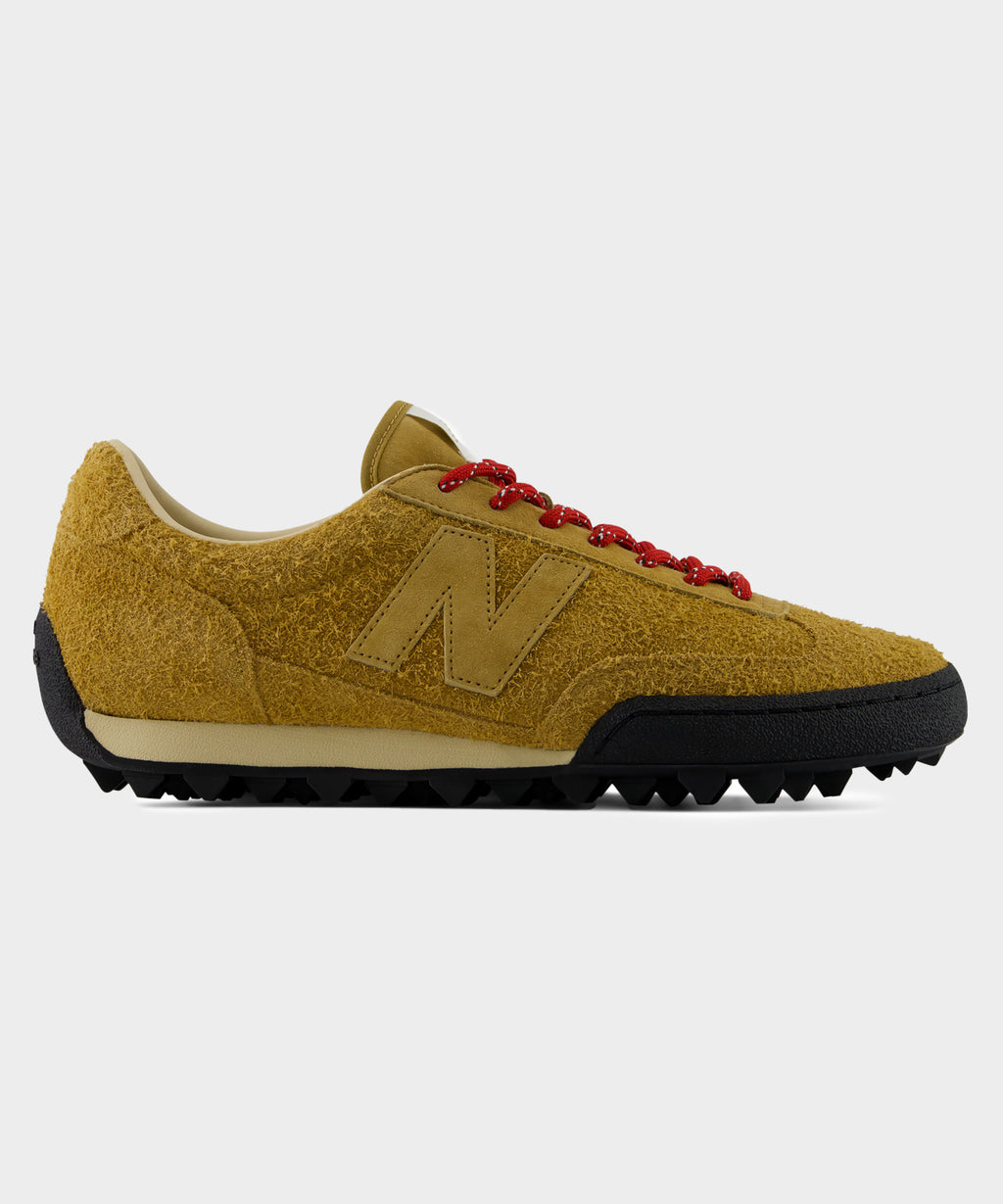 Side profile of the New Balance Gator Run Sneaker.